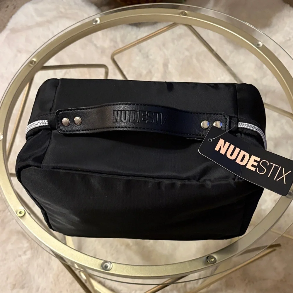 NUDESTIX compact travel